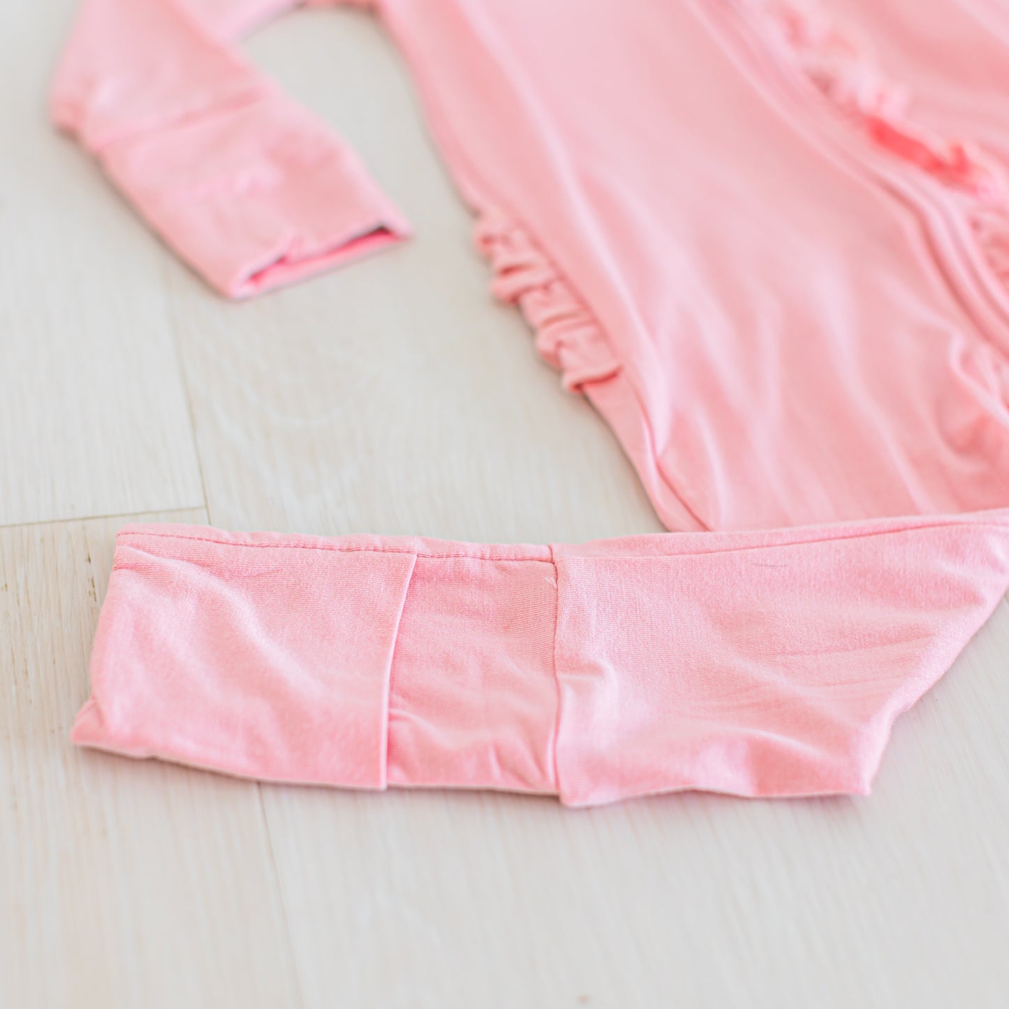 Solid Blush Ruffle Zippy