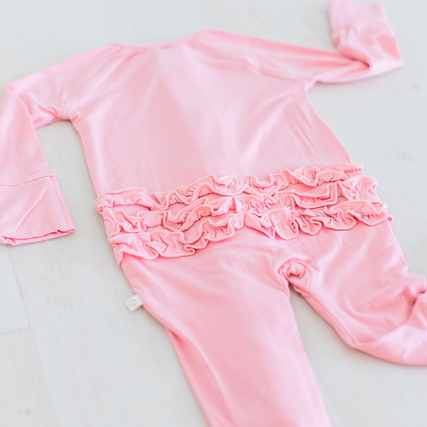Solid Blush Ruffle Zippy